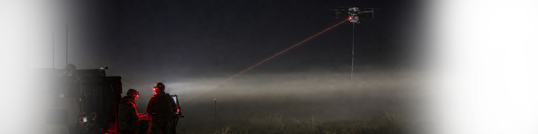 Free-space optical drone mesh redirecting a beam around terrain